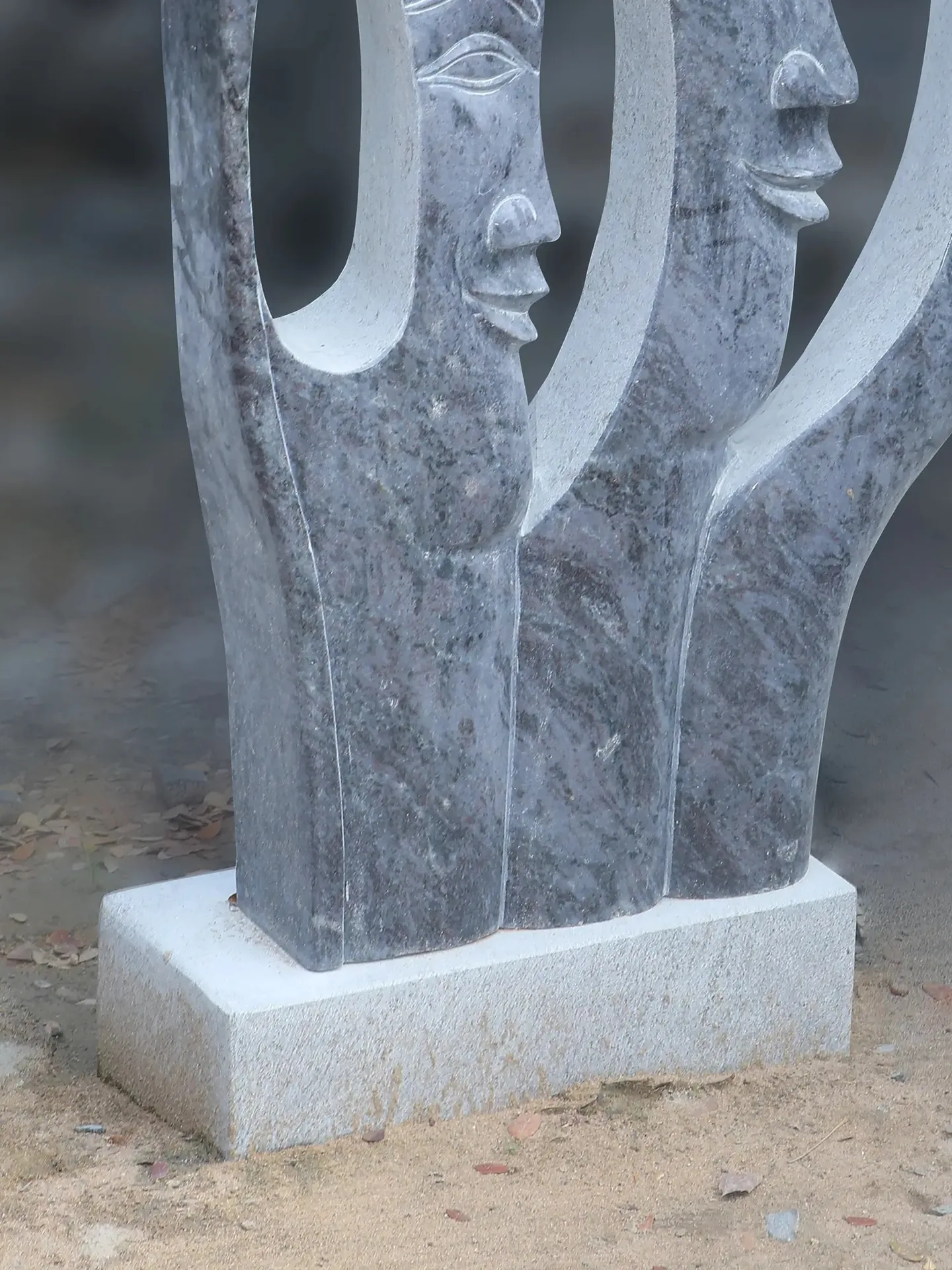 Multiple Faces - Sculpture carved in natural stone, JJM Stone Art UAE