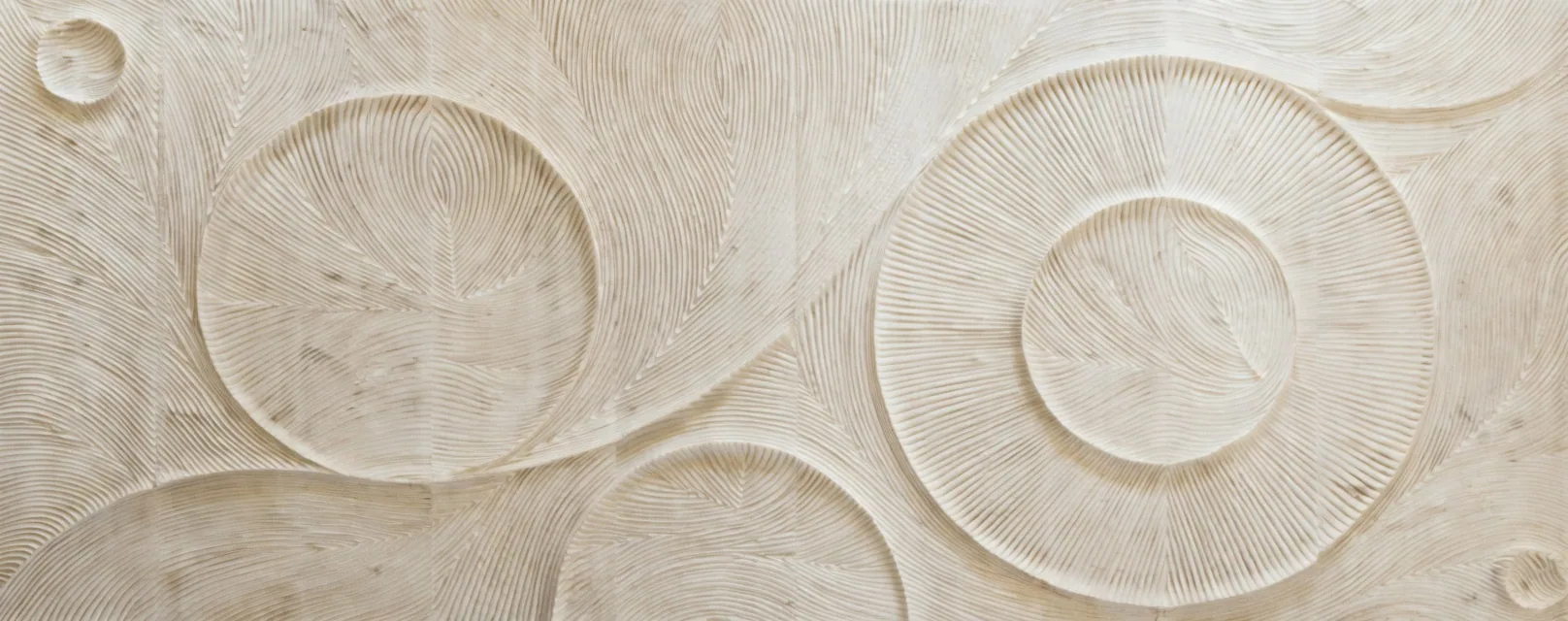 Nautilus - Carved Feature Wall carved in natural stone, JJM Stone Art UAE